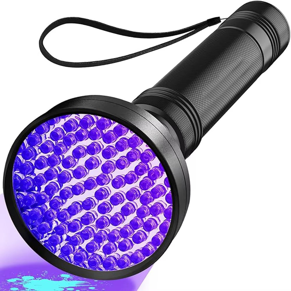 UV flashlight revealing pet stain, alternate view